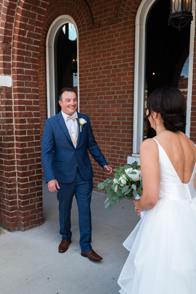 Groom reacts to seeing bride in her dress